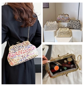Macro view of sequin evening bag interior with chain and colorful leopard patterns