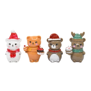 Set of four cute resin Christmas animal figurines including bears and reindeer on white background