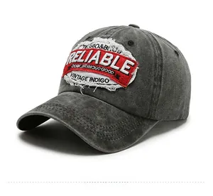 Detail of vintage washed canvas baseball cap with distressed reliable embroidery patch