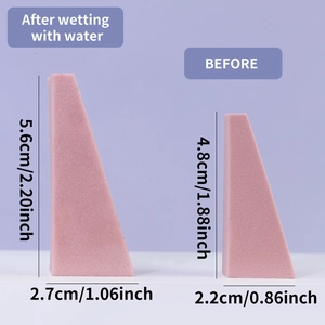 Pink triangular non-latex makeup sponge showing size expansion after water absorption