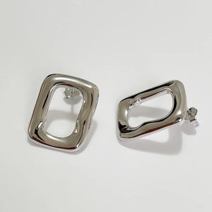 Minimalist 925 sterling silver irregular rectangular stud earrings on white background
