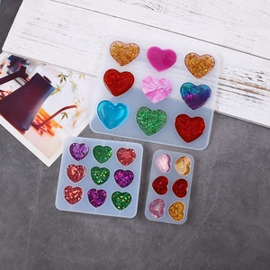 DIY silicone heart molds for resin crafts featuring various colorful heart designs