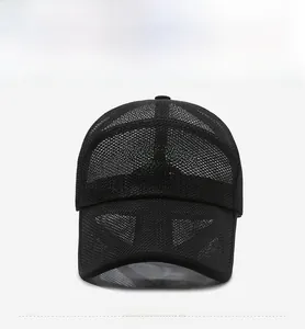 Close-up of black mesh baseball cap featuring TRADITIONS lettering and breathable holes