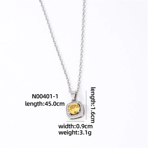 Macro shot showing dimensions and silver chain with yellow zircon pendant details