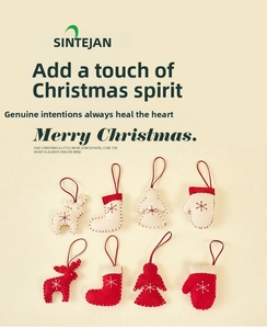 Detail of felt Christmas ornaments featuring reindeer and snowflake embroidery decor