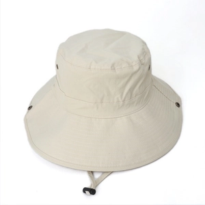 Detail view of quick-dry fishing hat with wide brim, metal vents and adjustable chin strap
