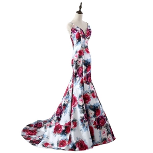 Elegant white satin mermaid evening gown with red rose floral print and V-neck silhouette