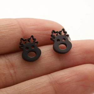 Detail of matte black stainless steel reindeer earrings with hollow star horn design