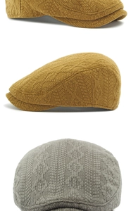 Detail of knitted beret hats showing dense diamond texture and sturdy short brim design