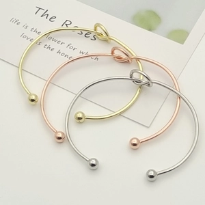 Minimalist knot open bracelets in gold, silver, and rose gold finishes for women