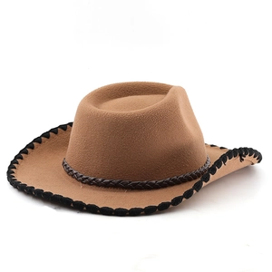 Close-up of light brown felt fedora featuring black braided edge and decorative band
