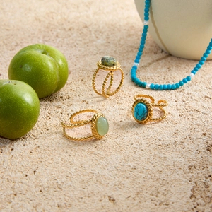 18K gold plated stainless steel rings featuring turquoise and gemstone on sand texture