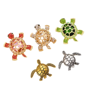 Lot de broches tortue vintage plaquées or et argent avec cristaux colorés