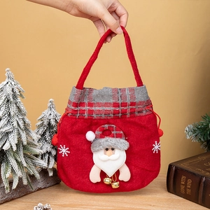 Red Christmas gift bag with plush Santa design, festive bells and drawstring closure