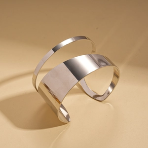 Polished silver irregular double-layer open cuff bracelet with minimalist geometric design