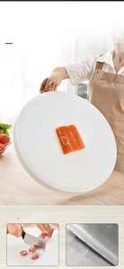 Macro detail of the durable PE plastic cutting board with non-slip texture and metal handle