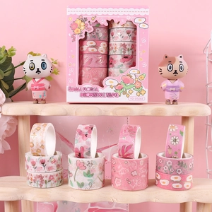 Pink floral washi tape set with cute decorative masking tapes for DIY journaling and scrapbooking.