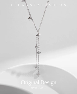 Elegant s925 silver Y-shaped necklace with star pendants and tassel in a minimalist style