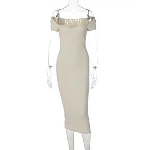 Detail view of beige off-shoulder ribbed knit dress with professional slim fit profile