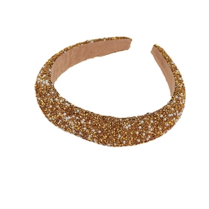 Elegant gold padded headband with glittering rhinestones and white pearls for women