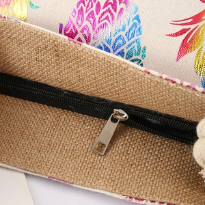 Close-up of durable canvas shopping bag with pineapple print and sturdy nylon zipper closure