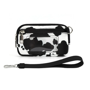Detail of cow print card holder with transparent ID window and black wrist lanyard