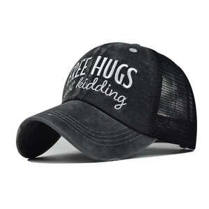 Distressed charcoal baseball cap featuring Free Hugs embroidery and breathable black mesh