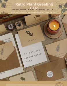 Detail of vintage botanical greeting cards with kraft envelopes and handwritten notes