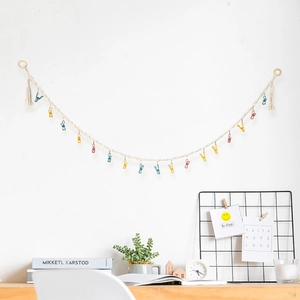 Cotton braided wall hanging organizer with colorful clips for plush toys and photos