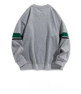 Detailed back view of a grey crewneck sweatshirt with green and black striped sleeve bands