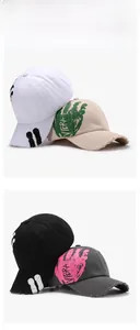 Detailed set of four distressed baseball caps with embroidered letters in various colors