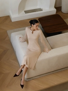 Slim fit beige ribbed knit midi dress with bell sleeves and hollow neckline detail
