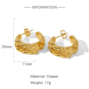Detailed view of gold copper irregular earrings with dimensions 25mm by 11mm