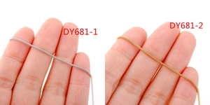 Macro comparison of gold and silver snake bone chains for DIY jewelry making