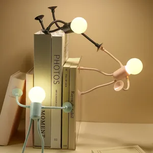 Mini colorful bulb person night light with suction cups on limbs for desk decoration