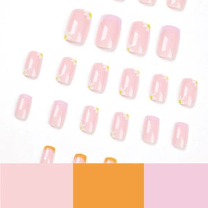 Press-on nails with yellow and purple French tips and daisy floral designs in square oval shape