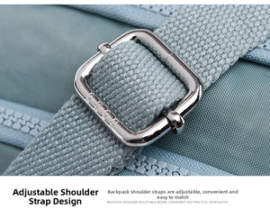 Detail of adjustable bag strap with silver metal buckle and premium nylon texture