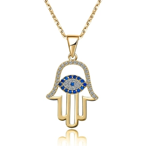 Gold Hamsa Hand necklace with blue Evil Eye pendant and white zircon stones on white background