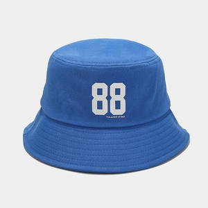 Detailed macro view of the 88 printed cotton fabric on this navy blue bucket hat