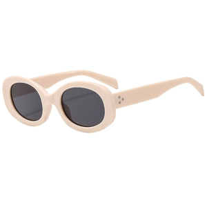 Retro oval sunglasses in beige frames with black lenses and triple metal rivet accents