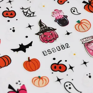 Close-up of LS-J82 nail stickers featuring pumpkins, ghosts and witch hats for Halloween
