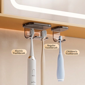 Wall-mounted magnetic toothbrush holder in dark grey translucent plastic for bathroom