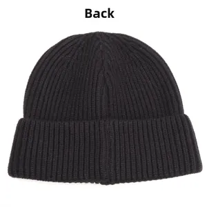 Detailed back view of a black ribbed knit beanie with thick thermal insulation texture