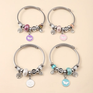 Set of four stainless steel beaded bracelets with colorful tree of life and butterfly charms