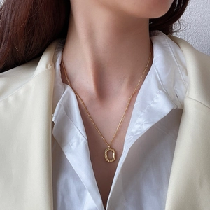 Elegant 925 sterling silver golden doughnut pendant necklace for women on a model