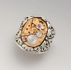 Mechanical 17 jewels gear ring in silver and gold tones with precision ruby bearings
