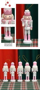 Detailed views of 13cm pink and white wooden nutcracker soldier with lollipop detail