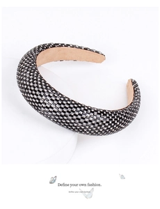 Detail of wide black headband with square rhinestones and non-slip velvet lining