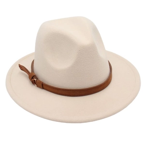 Close-up of cream wool felt fedora featuring a brown suede band and metal buckle detail