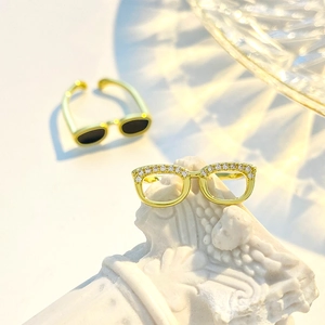 Mini glasses shaped adjustable open rings in gold finish with zircon inlay and black enamel